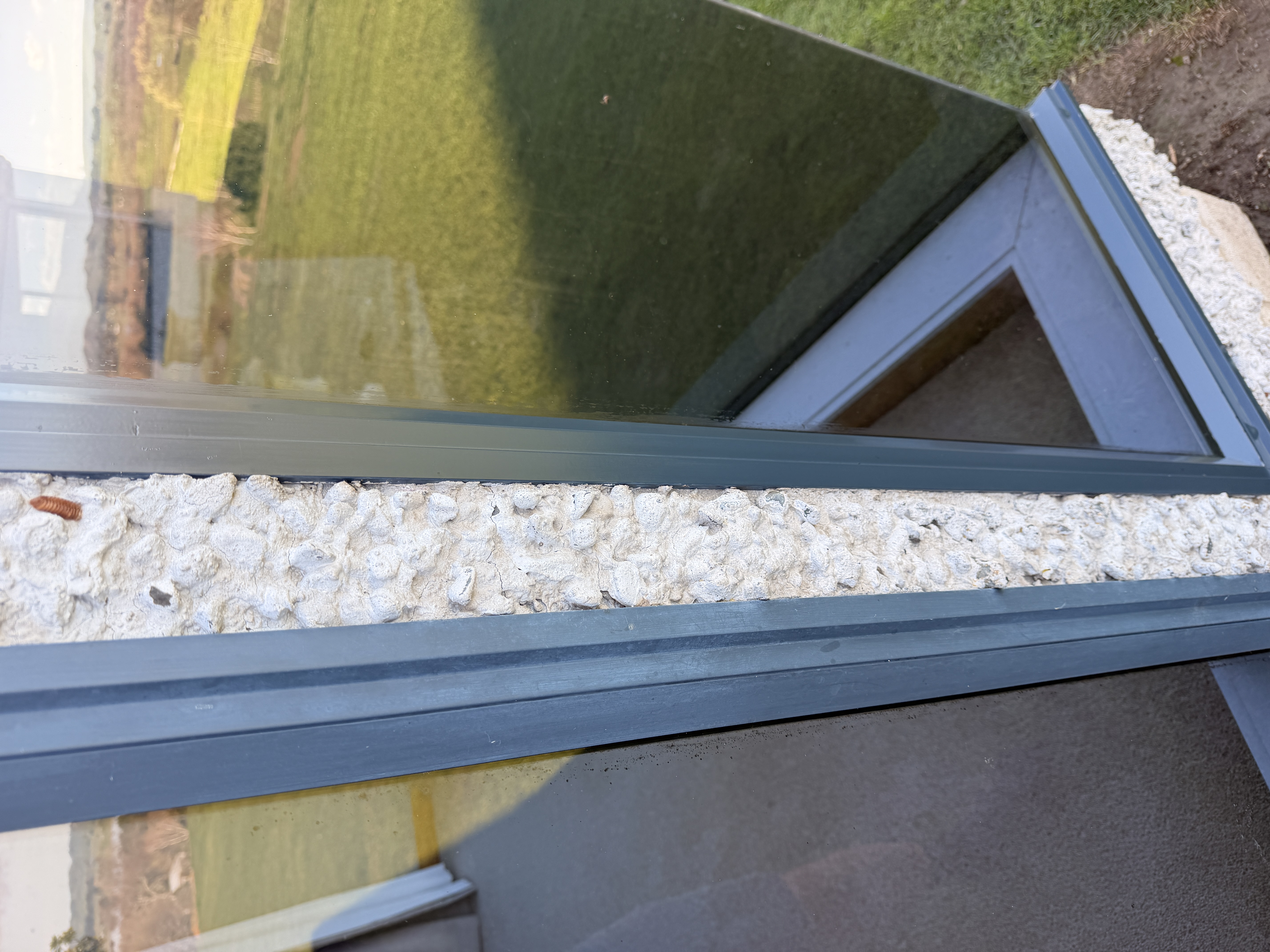 Window frame — left side before treatment, right side after